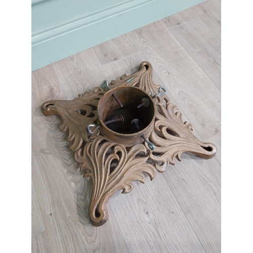 881 - Decorative cast iron Christmas tree stand {14 cm H x 44 cm W x 44 cm D}.