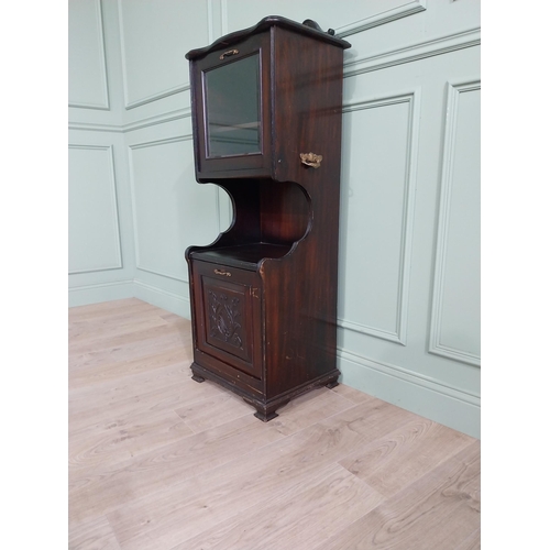 885 - Edwardian mahogany music cabinet with metal mounts {140 cm H x 50 cm W x 40 cm D}.