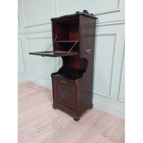 885 - Edwardian mahogany music cabinet with metal mounts {140 cm H x 50 cm W x 40 cm D}.