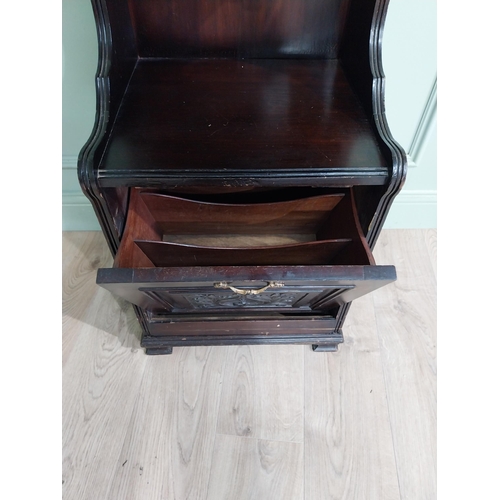 885 - Edwardian mahogany music cabinet with metal mounts {140 cm H x 50 cm W x 40 cm D}.