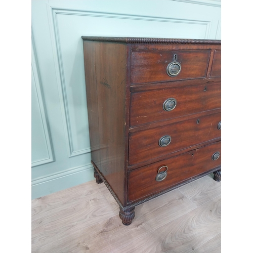 89 - 19th C. mahogany chest of drawers with two short drawers over three long graduated drawers raised on... 