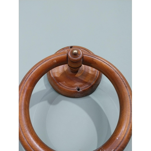 893 - Mahogany wall mounted towel holder {23 cm H x 18 cm W x 7 cm D}.