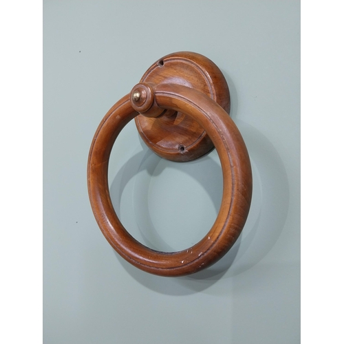 893 - Mahogany wall mounted towel holder {23 cm H x 18 cm W x 7 cm D}.