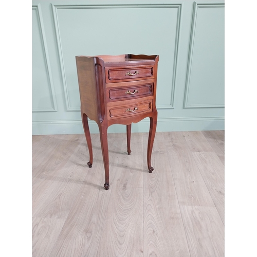 903 - Edwardian French mahogany bedside locker with three drawers raised on cabriole legs {73 cm H x 36 cm... 