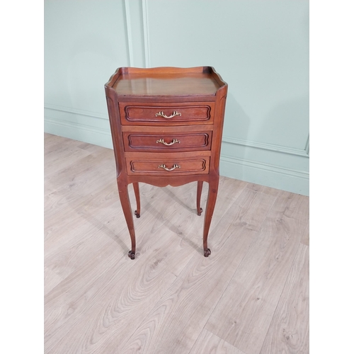 903 - Edwardian French mahogany bedside locker with three drawers raised on cabriole legs {73 cm H x 36 cm... 