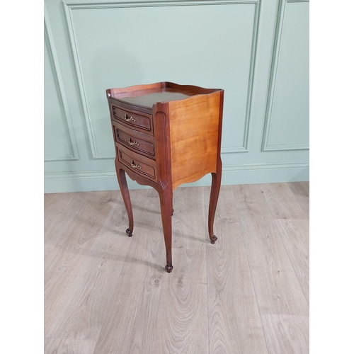 903 - Edwardian French mahogany bedside locker with three drawers raised on cabriole legs {73 cm H x 36 cm... 