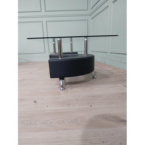 909 - Chrome and leather coffee table with glass top {45 cm H x 129 cm W x 70 cm D}.