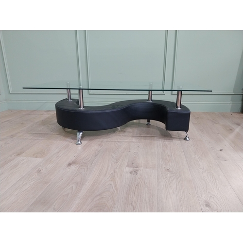 909 - Chrome and leather coffee table with glass top {45 cm H x 129 cm W x 70 cm D}.