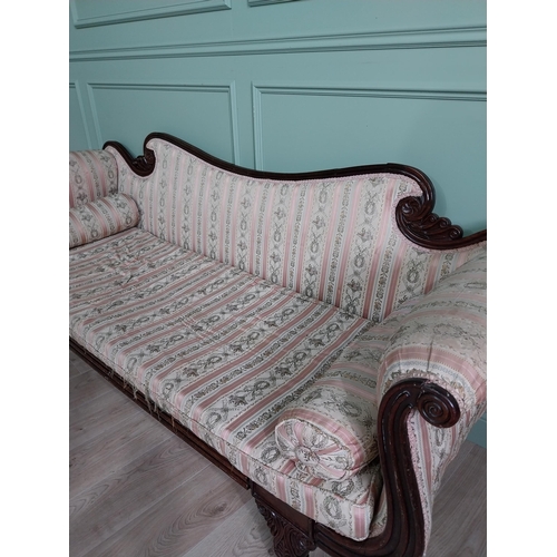 910 - Regency mahogany and upholstered sofa raised on turned legs and castors {89 cm H x 210 cm W x 70 cm ... 