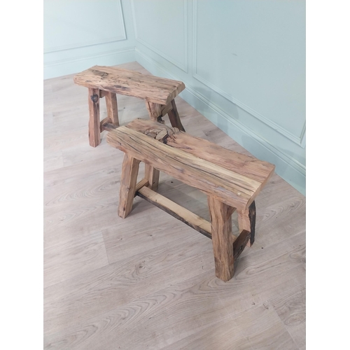 914 - Pair of vintage rustic oak stools raised on splayed legs {48 cm H x 61 cm W x 26 cm D}.