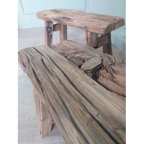 914 - Pair of vintage rustic oak stools raised on splayed legs {48 cm H x 61 cm W x 26 cm D}.