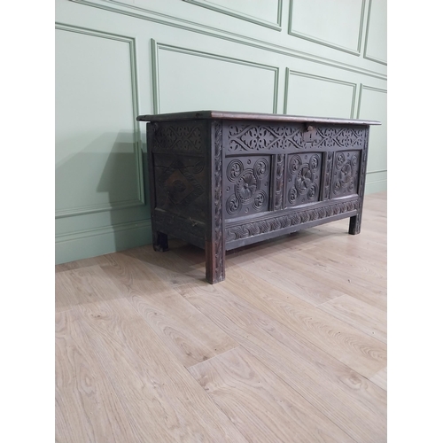 92 - 18th C. carved oak blanket box {70 cm H x 134 cm W x 58 cm D}.