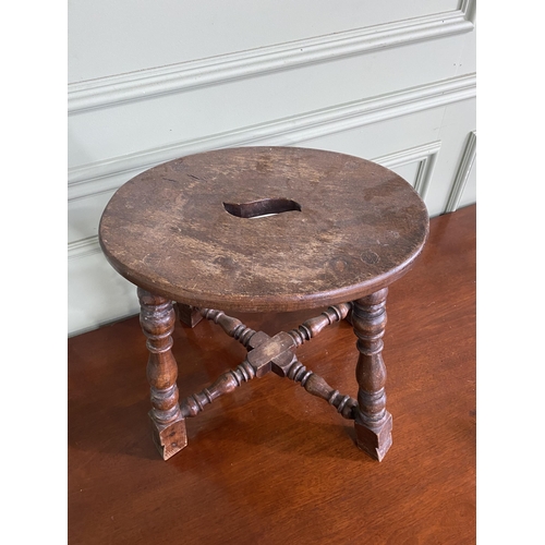 923 - Early 20th C. oak stool raised on turned legs and cross stretchers {40 cm H x 40 cm W x 30 cm D}.