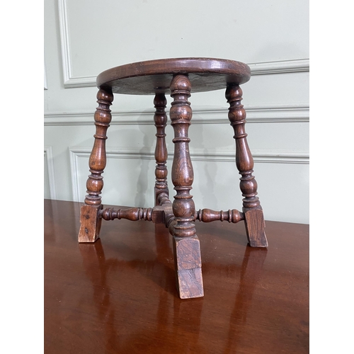 923 - Early 20th C. oak stool raised on turned legs and cross stretchers {40 cm H x 40 cm W x 30 cm D}.