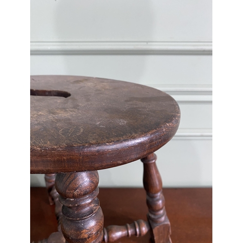 923 - Early 20th C. oak stool raised on turned legs and cross stretchers {40 cm H x 40 cm W x 30 cm D}.