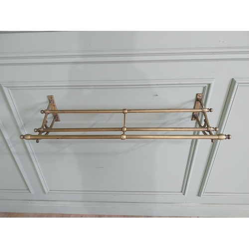 925 - Early 20th C. French brass luggage rack {16 cm H x 81 cm W x 30 cm D}.