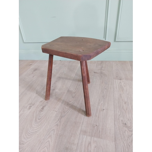 930 - Early 20th C. oak three legged milking stool {41 cm H x 40 cm W x 30 cm D}.