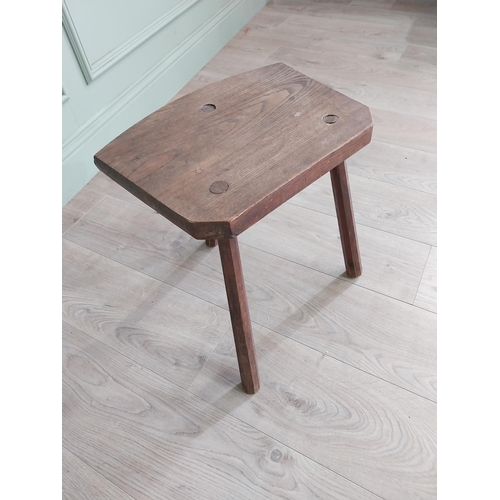 930 - Early 20th C. oak three legged milking stool {41 cm H x 40 cm W x 30 cm D}.