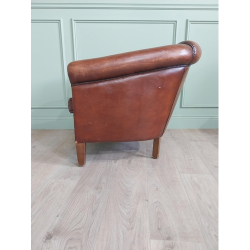 932 - French hand dyed leather club chair raised on square tapered legs {75 cm H x 78 cm W x 90 cm D}.