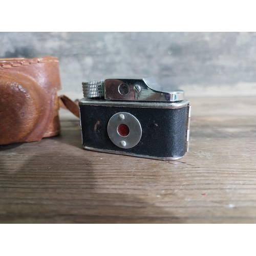 941 - HIT camera in leather case made in Japan.