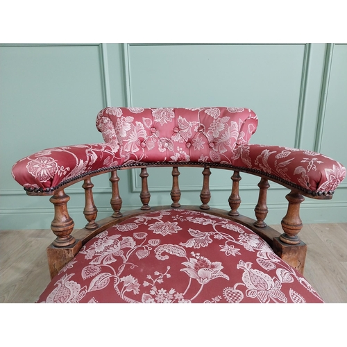 956 - Victorian mahogany and upholstered armchair raised on turned legs and brass castors {73 cm H x 67 cm... 