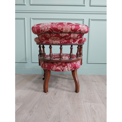 956 - Victorian mahogany and upholstered armchair raised on turned legs and brass castors {73 cm H x 67 cm... 