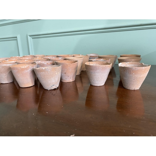 973 - Collection of thirty five early 20th C. terracotta plant seed pots {6 cm H x 7 cm Dia.}.