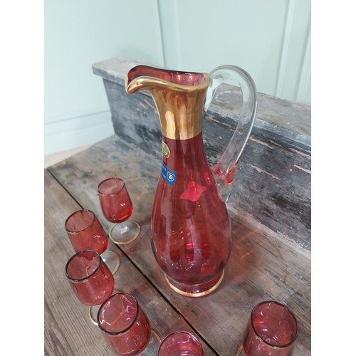 975 - Bohemian ruby glass jug with six matching glasses {Jug 26 cm H x 10 cm W x 11 cm D and Glasses 9 cm ... 