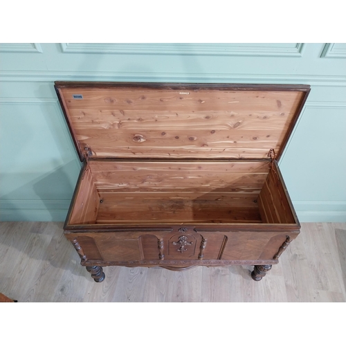 989 - Edwardian walnut blanket box raised on turned legs and single stretcher in the Tudor style {76 cm H ... 