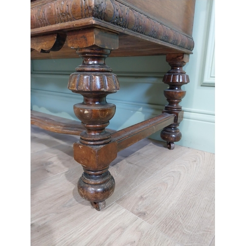 989 - Edwardian walnut blanket box raised on turned legs and single stretcher in the Tudor style {76 cm H ... 