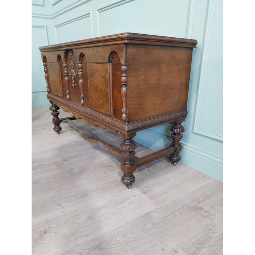 989 - Edwardian walnut blanket box raised on turned legs and single stretcher in the Tudor style {76 cm H ... 