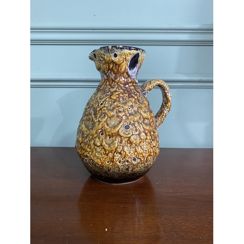 993 - Mid-century West German pottery jug with some damage {25 cm H x 18 cm W x 17 cm D}.