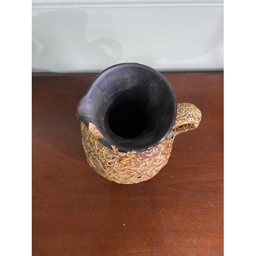 993 - Mid-century West German pottery jug with some damage {25 cm H x 18 cm W x 17 cm D}.