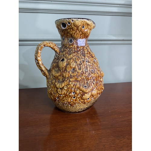 993 - Mid-century West German pottery jug with some damage {25 cm H x 18 cm W x 17 cm D}.