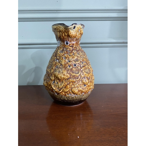 993 - Mid-century West German pottery jug with some damage {25 cm H x 18 cm W x 17 cm D}.