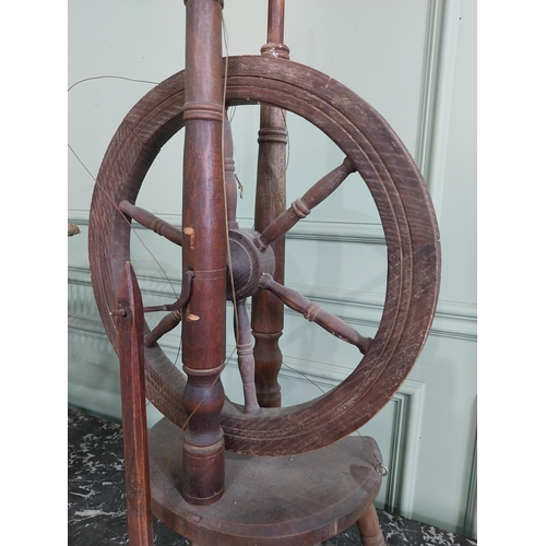 998 - Early 20th C. wicker child's pram and walnut spinning wheel {63 cm H x 65 cm W x 36 cm D and 75 cm H... 