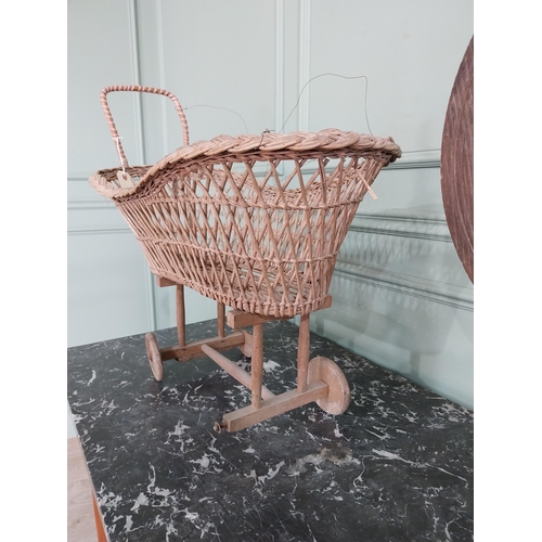 998 - Early 20th C. wicker child's pram and walnut spinning wheel {63 cm H x 65 cm W x 36 cm D and 75 cm H... 