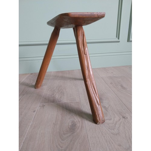 1204 - 19th C. Irish painted elm three legged stool {36 cm H x 40 cm W x 36 cm D}.