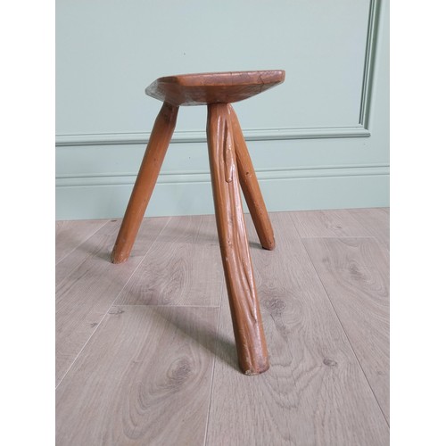 1204 - 19th C. Irish painted elm three legged stool {36 cm H x 40 cm W x 36 cm D}.