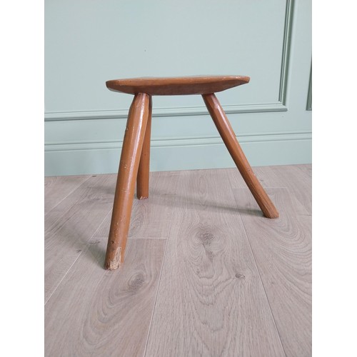 1204 - 19th C. Irish painted elm three legged stool {36 cm H x 40 cm W x 36 cm D}.