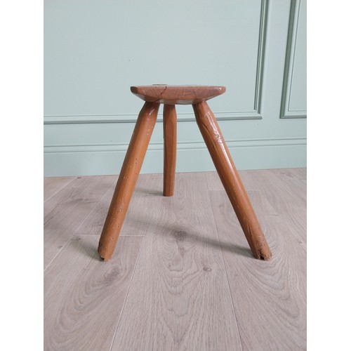 1204 - 19th C. Irish painted elm three legged stool {36 cm H x 40 cm W x 36 cm D}.