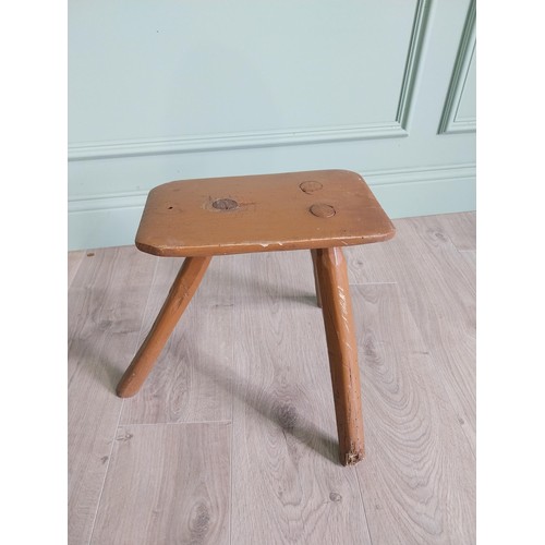 1204 - 19th C. Irish painted elm three legged stool {36 cm H x 40 cm W x 36 cm D}.