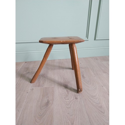 1204 - 19th C. Irish painted elm three legged stool {36 cm H x 40 cm W x 36 cm D}.