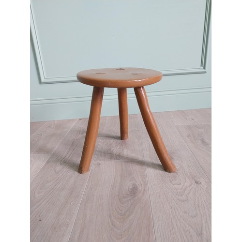 1305 - 19th C. Irish painted elm three legged stool {31 cm H x 31 cm Dia.}.