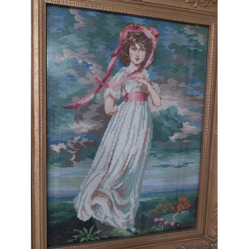 999 - Gilt framed embroidery depicting a Lady {59 cm H x 46 cm W}.