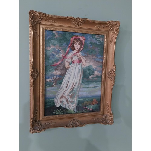 999 - Gilt framed embroidery depicting a Lady {59 cm H x 46 cm W}.