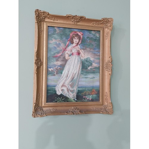 999 - Gilt framed embroidery depicting a Lady {59 cm H x 46 cm W}.