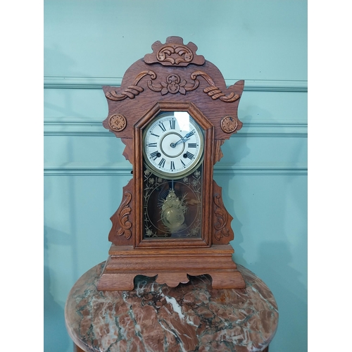 2028 - Early 20th C. oak gingerbread clock. {60 cm H x 37 cm W x 14 cm D}.