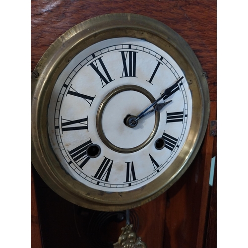 2028 - Early 20th C. oak gingerbread clock. {60 cm H x 37 cm W x 14 cm D}.