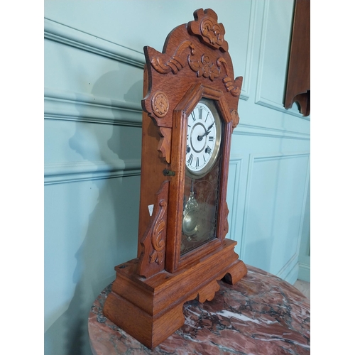 2028 - Early 20th C. oak gingerbread clock. {60 cm H x 37 cm W x 14 cm D}.